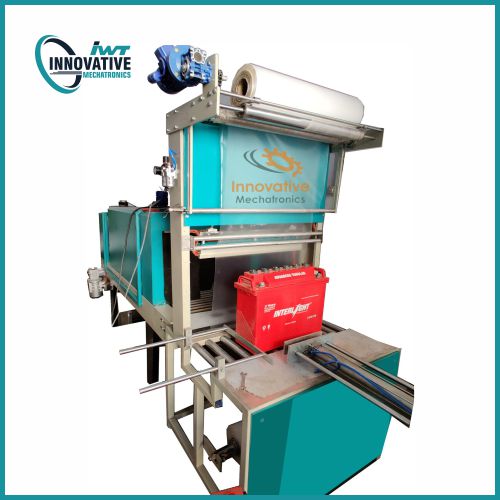 Bottle shrink wrapping machine wrapping multiple bottles with shrink film