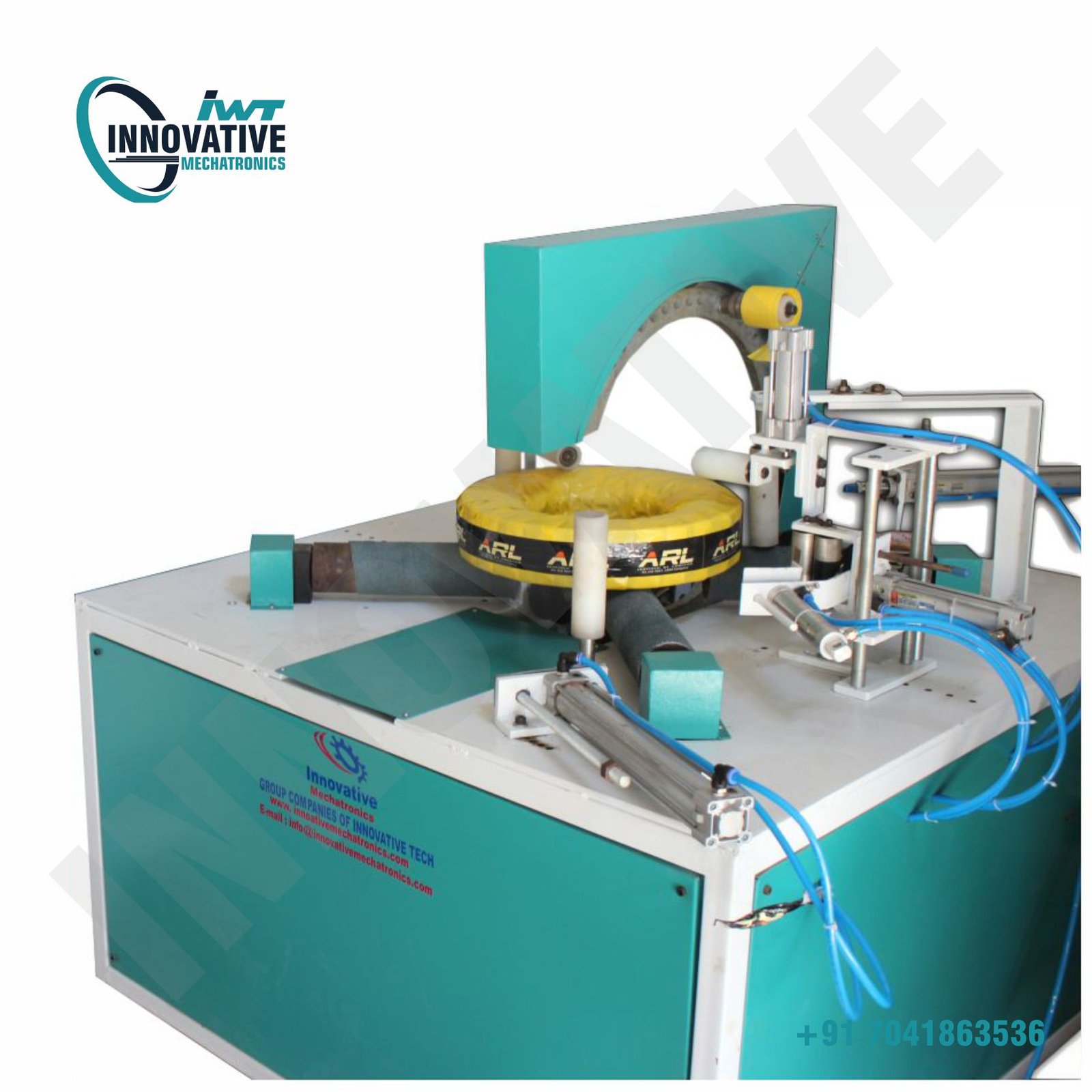 Big bearing coil packing machine wrapping large bearing coils with protective stretch film in an industrial facility