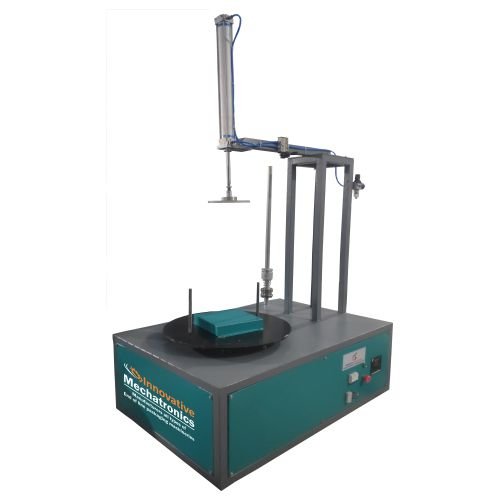 Box wrapping machine with holding system securing cartons during packaging