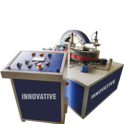 Garden pipe wrapping machine packing coiled garden hoses and pipes with stretch film in an industrial facility