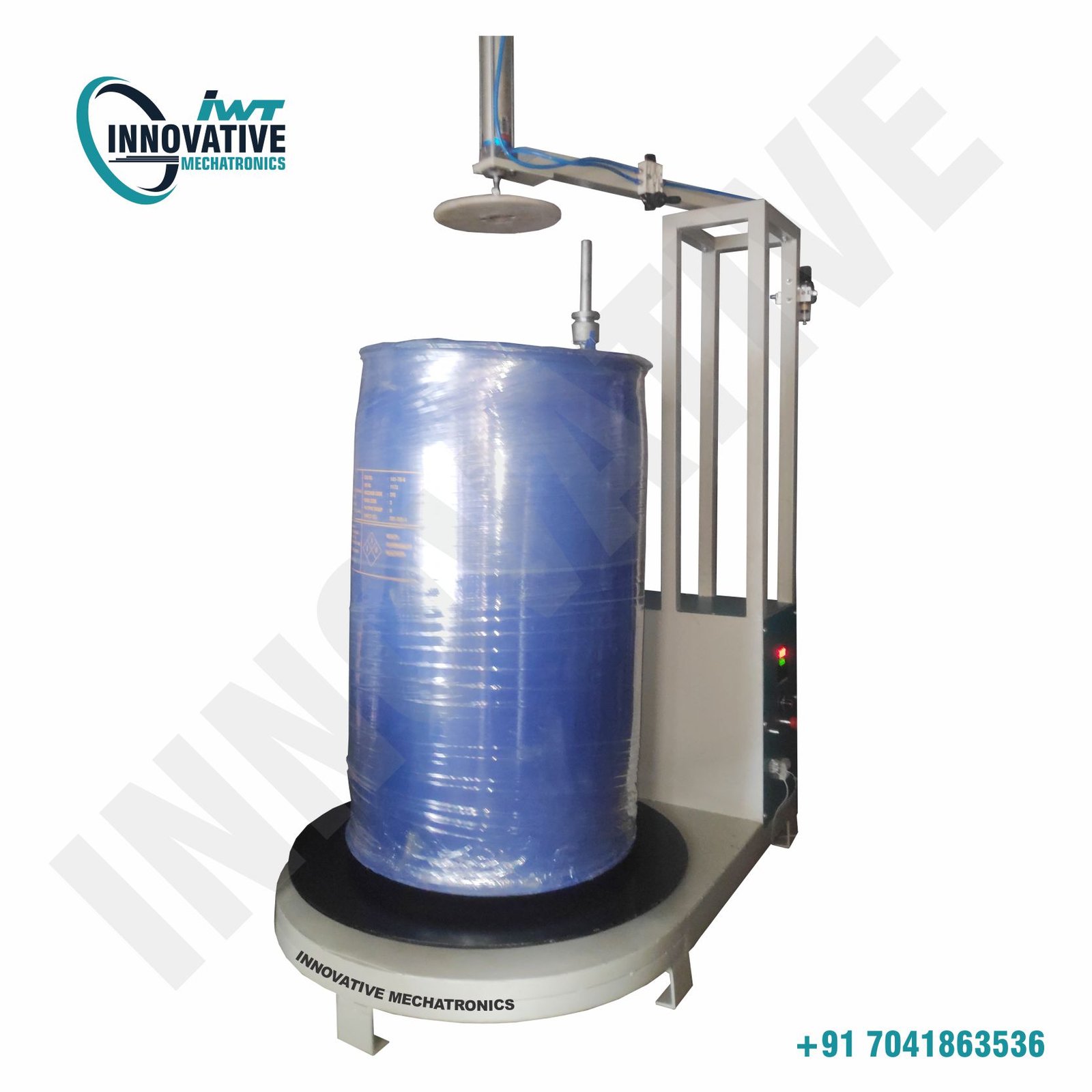 Single Drum Packing Machine by Innovative WrapTech Pvt. Ltd. for secure and efficient industrial drum packaging.