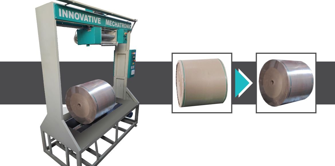 Automated roll stretch wrapping machine wrapping a large industrial paper roll in protective stretch film by Innovative Wraptech